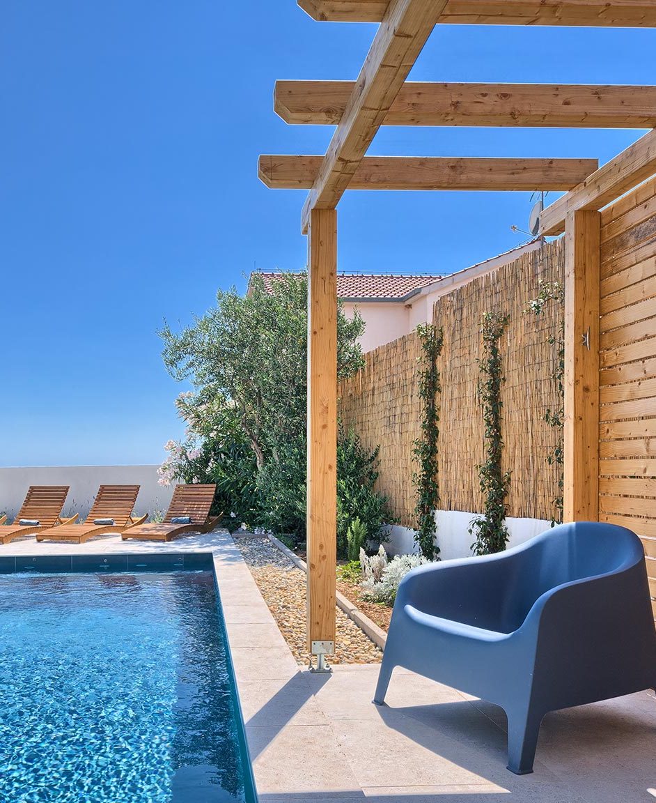 shade by the pool at holiday house Porto Manera